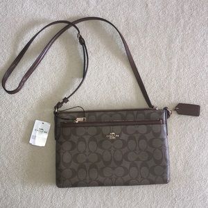Brown Coach signature crossbody bag